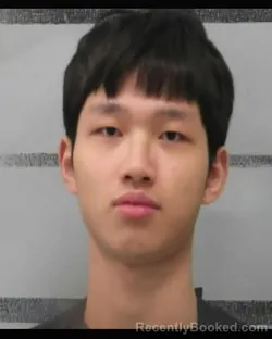 Mugshot of LIU LIXIN booked in Lubbock County, Texas on March 24, 2026