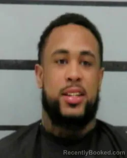 Mugshot of AKKINI MCDADE booked in Lubbock County, Texas on March 24, 2026