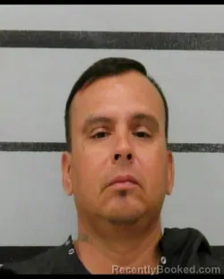 Mugshot of AUGUSTIN MUNGIA booked in Lubbock County, Texas on July 28, 2026
