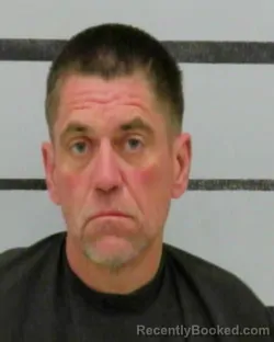 Mugshot of DANNY MOORE