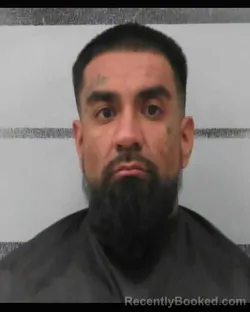 Mugshot of CARLOS RUBEN OLIVARES booked in Lubbock County, Texas on May 15, 2026