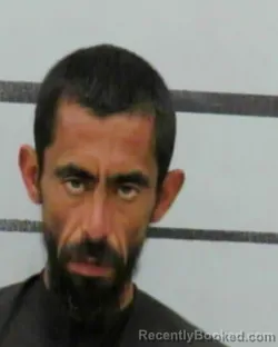 Mugshot of RAYMOND OLIVAS booked in Lubbock County, Texas on April 4, 2026