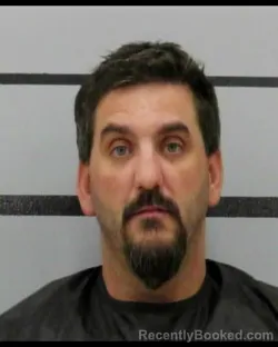 Mugshot of JONATHON MICHAEL WARFORD booked in Lubbock County, Texas on August 4, 2026