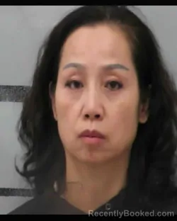 Mugshot of QINRONG WU booked in Lubbock County, Texas on March 24, 2026