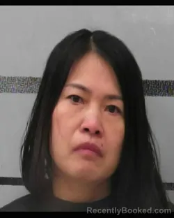 Mugshot of ZHANG WEIHONG booked in Lubbock County, Texas on March 23, 2026