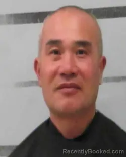 Mugshot of FENGLONG ZHENG booked in Lubbock County, Texas on July 29, 2026