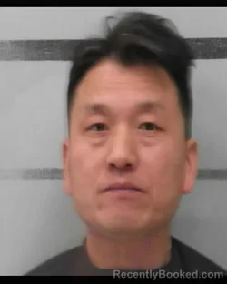 Mugshot of GANG ZHU booked in Lubbock County, Texas on March 24, 2026