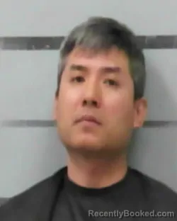 Mugshot of Xiaofei Zhou booked in Lubbock County, Texas on August 29, 2026