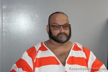 Mugshot of JUSTIN ELEIOTT LEE booked in Madison County, Texas on April 8, 2026