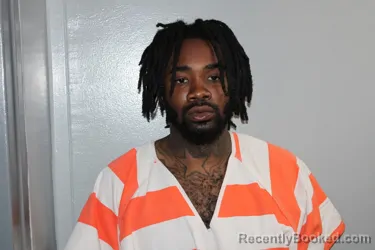 Mugshot of CHARLESTON DAVONTE SCARLETT booked in Madison County, Texas on April 23, 2026