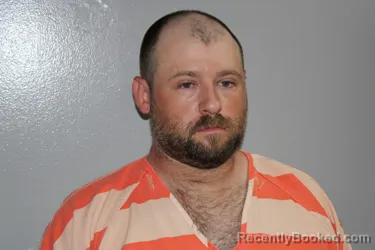 Mugshot of NEAMAN WAYNE HUGHES booked in Madison County, Texas on June 14, 2026
