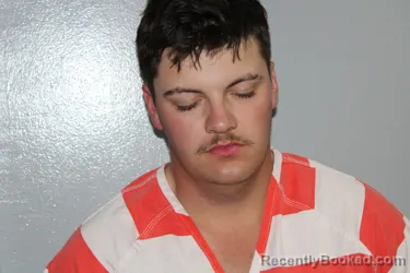 Mugshot of KOPELAN SCOTT HECKMAN booked in Madison County, Texas on June 21, 2026