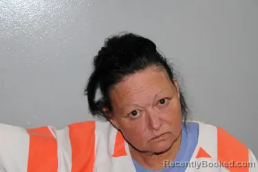 Mugshot of CARMEN LEIGH SANDIFER booked in Madison County, Texas on July 8, 2026