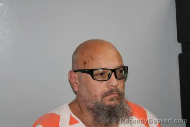 Mugshot of Bradley Joseph Flores booked in Madison County, Texas on October 2, 2026