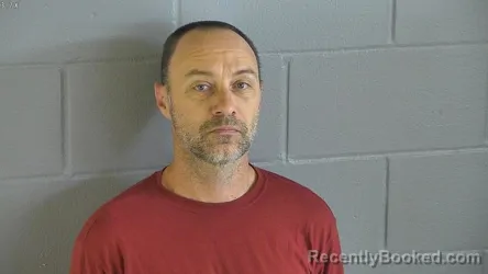 Mugshot of JUSTIN KALE PENNEY