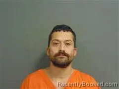 Mugshot of RHANDOM ARELLANO