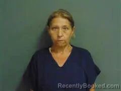 Mugshot of JENNIFER MERKLE booked in Milam County, Texas on April 27, 2026