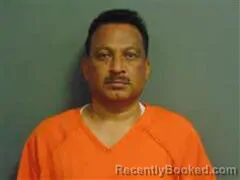 Mugshot of Geevar Varghese booked in Milam County, Texas on August 29, 2026