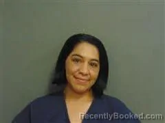 Mugshot of Anna Casas booked in Milam County, Texas on October 13, 2026
