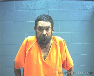 Mugshot of Russell Wade Baker booked in Mills County, Texas on October 4, 2026