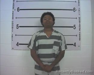 Mugshot of AARZO JAMAL RHODES booked in Montague County, Texas on March 28, 2026