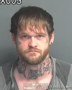 Mugshot of ZACHARY NORMAN SIMONS