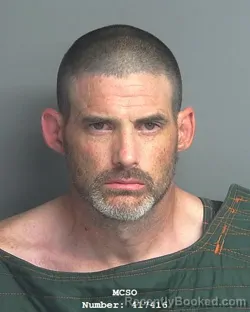 Mugshot of MATTHEW DON FAUGHT