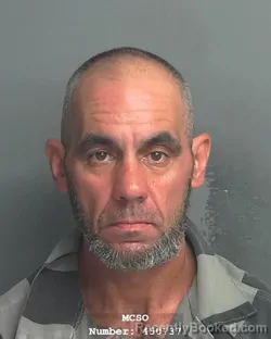 Mugshot of DUSTIN MORRIS LANE