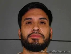 Mugshot of Julian Ernesto Aguilar booked in Moore County, Texas on October 14, 2026