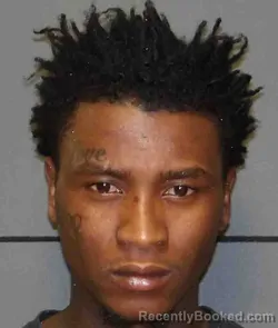 Mugshot of JACKSON TUYISHIME booked in Moore County, Texas on March 28, 2026