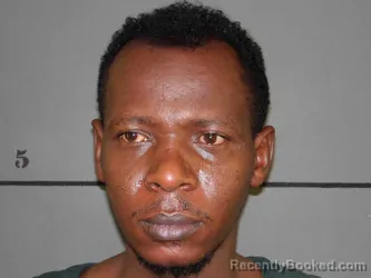 Mugshot of MUDASARIKA VEDASTE booked in Moore County, Texas on March 28, 2026