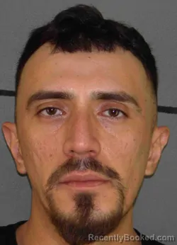 Mugshot of JUAN ESPARZA booked in Moore County, Texas on April 7, 2026