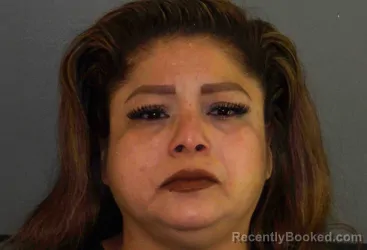 Mugshot of SILVIA GRACIELA PENA booked in Moore County, Texas on May 12, 2026