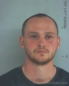 Mugshot of JUSTIN MATTHEW DECKER