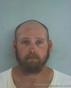 Mugshot of TOM EDWARD ROLLINS booked in Nacogdoches County, Texas on April 4, 2026