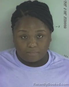 Mugshot of CAMREE VINNIK LATHAN booked in Nacogdoches County, Texas on April 16, 2026