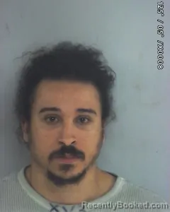 Mugshot of TAYLOR DYLAN WARNER booked in Nacogdoches County, Texas on May 12, 2026