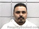 Mugshot of GERARDO BUSTOS-FLORES booked in Navarro County, Texas on May 15, 2026