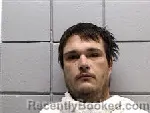 Mugshot of JOHN WILLIAM EVANS booked in Navarro County, Texas on May 17, 2026