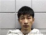 Mugshot of HUI XIE booked in Navarro County, Texas on July 31, 2026