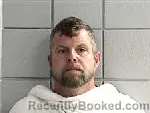 Mugshot of John Wayne Huston booked in Navarro County, Texas on September 9, 2026