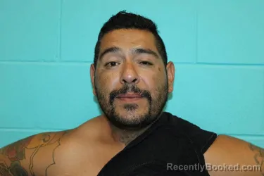 Mugshot of JAKE JESSE GUZMAN booked in Nolan County, Texas on May 27, 2026