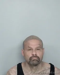 Mugshot of BURT FLORES booked in Nueces County, Texas on June 20, 2026