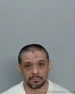 Mugshot of Oscar Barrios booked in Nueces County, Texas on August 27, 2026