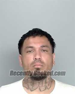 Mugshot of JULIAN COSME BENAVIDEZ