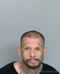 Mugshot of ROCKY DEVON GARCIA booked in Nueces County, Texas on April 26, 2026