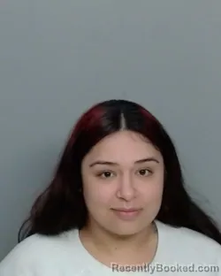 Mugshot of MERCEDES MAREE MARTINEZ booked in Nueces County, Texas on April 21, 2026