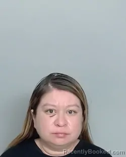 Mugshot of ALANA CONDE booked in Nueces County, Texas on May 20, 2026