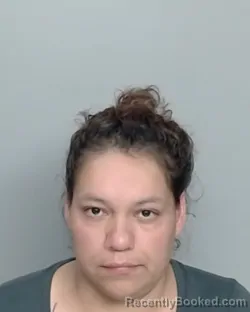 Mugshot of JUNE M. ALEMAN booked in Nueces County, Texas on April 7, 2026