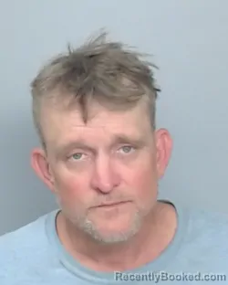 Mugshot of CHRISTOPHER WILLIAM RHYNE booked in Nueces County, Texas on April 14, 2026